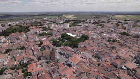 wide aerial pan of town of beja and surrounding landscape in portugal