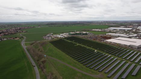 aerial shot, solar panels in the field