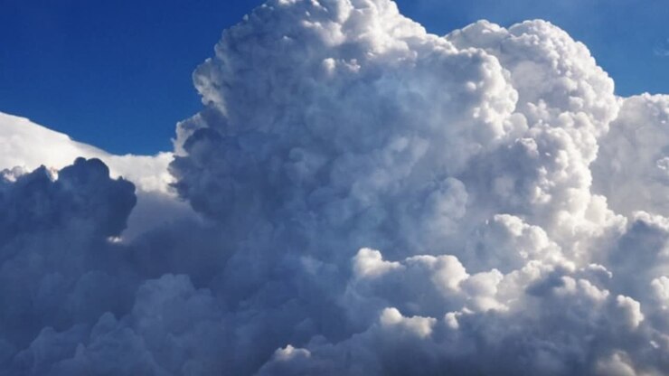 Majestic Cumulus Clouds in a Blue Sky