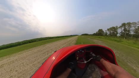 fpv of man operating hovercraft down a runway