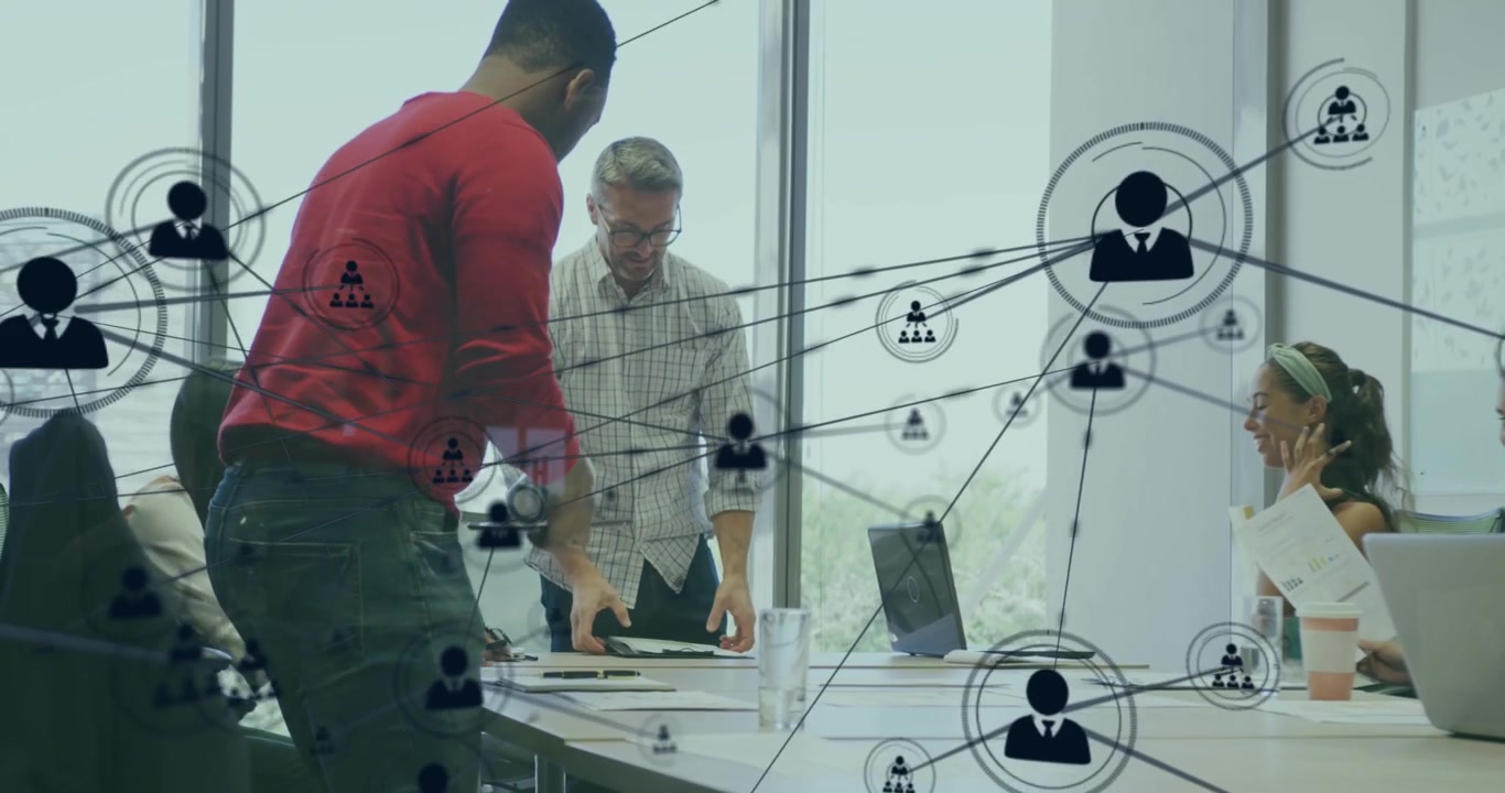 Animation of connected icons over diverse coworkers sitting on chairs to discuss reports in meeting