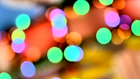 blurred colorful lights. red, green, yellow, orange, blue defocused glittering bokeh festive background. abstract multicolored light.