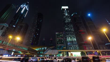 dubai luz nocturna iluminación ciudad tráfico en la calle vida 4k lapso de tiempo emiratos árabes unidos