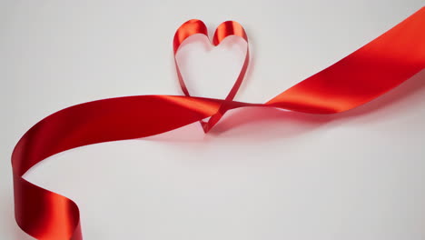 elegant red ribbon on white background
