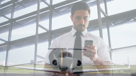 businessman using smartphone over airplane animation at airport terminal