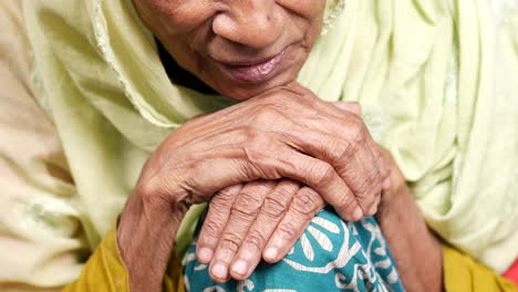elderly woman with wrinkled hands