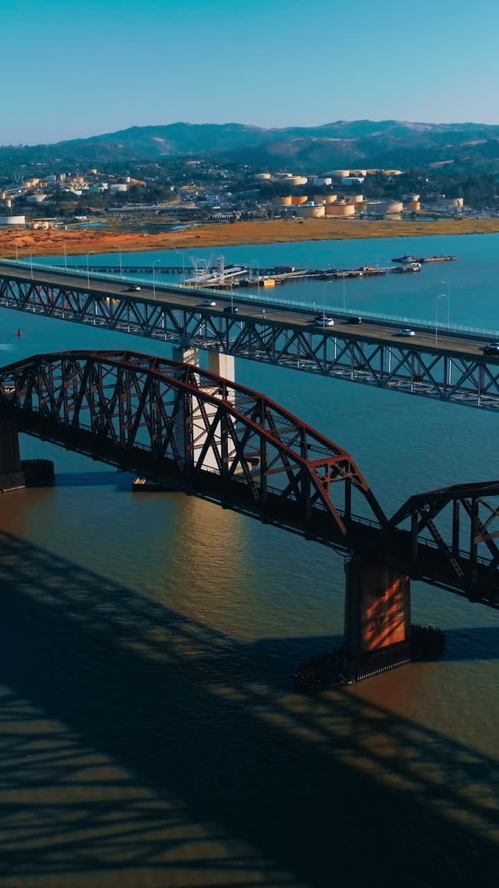 Aerial traffic bridge transportation. Martinez bridge connecting to Benicia. Vertical video