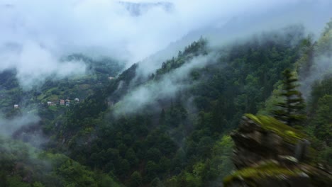 aerial view of mountains with clouds