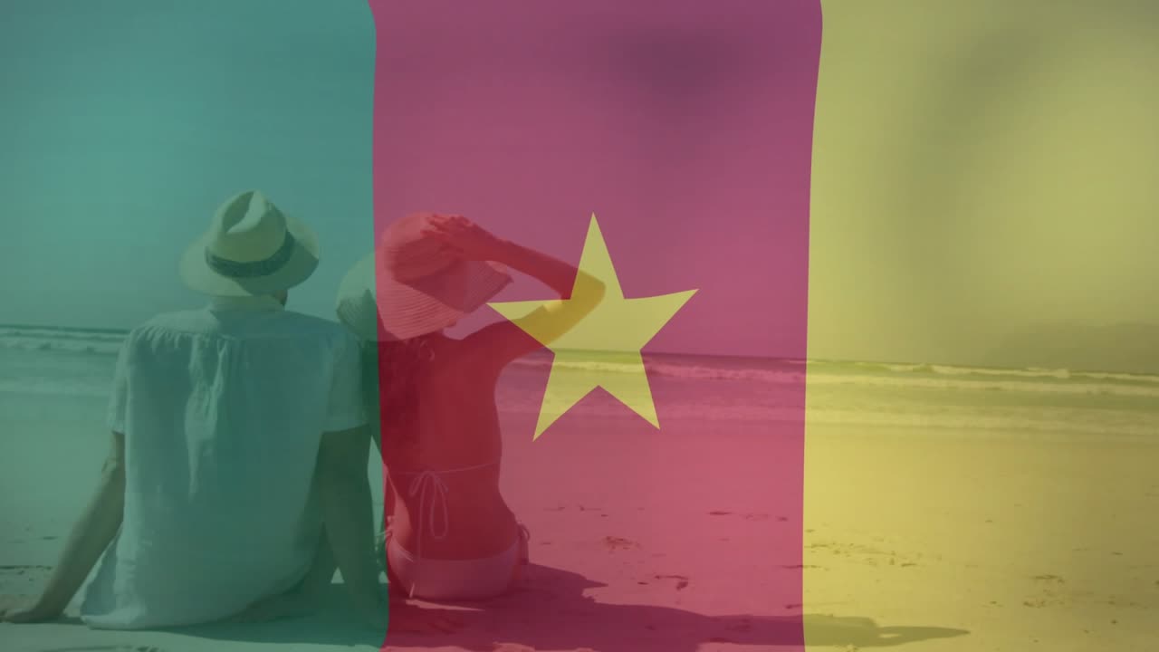 Couple sitting beach woman tilting hat to block sun partner shifting flag pulsing over scene travel