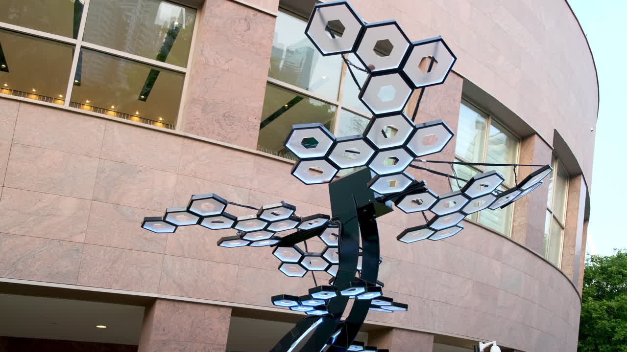 Modern Light Art Sculpture in Front of a Building