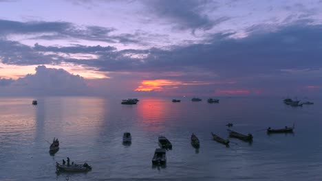 Sunset-Paints-Sky-with-Boats