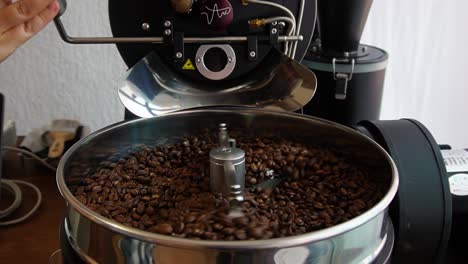 slow motion shot of roasting process of freshly roasted coffee