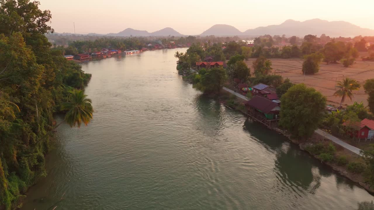 Aerial drone fly Laos Four Thousand 4k Islands, Scenic river in rural Agricultural Asian village, sunset mountain skyline