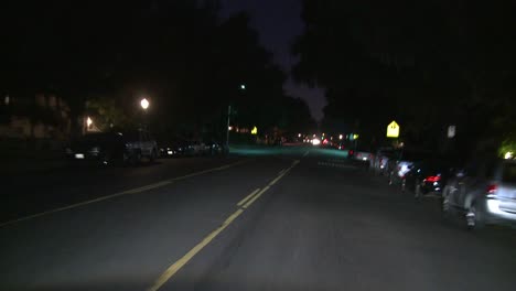 Pov-Of-A-Car-Traveling-Along-A-Street-At-Night-In-Los-Angeles-California-3