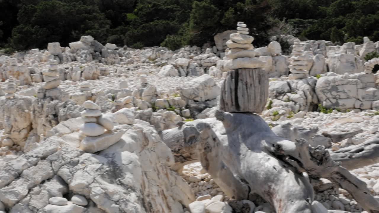 Sea Rocks On The Picturesque Paralia Emplisi Beach In Greece - panning shot