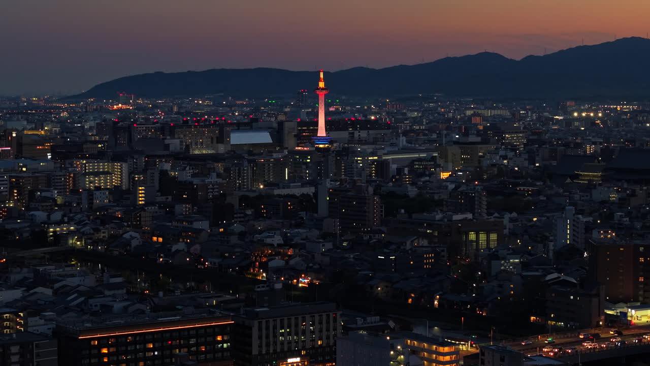 Aerial drone view of the Nidec Kyoto Tower in the evening