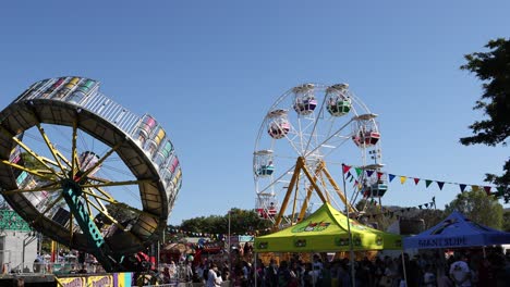 time-lapse of a ferris wheel spinning at a festival