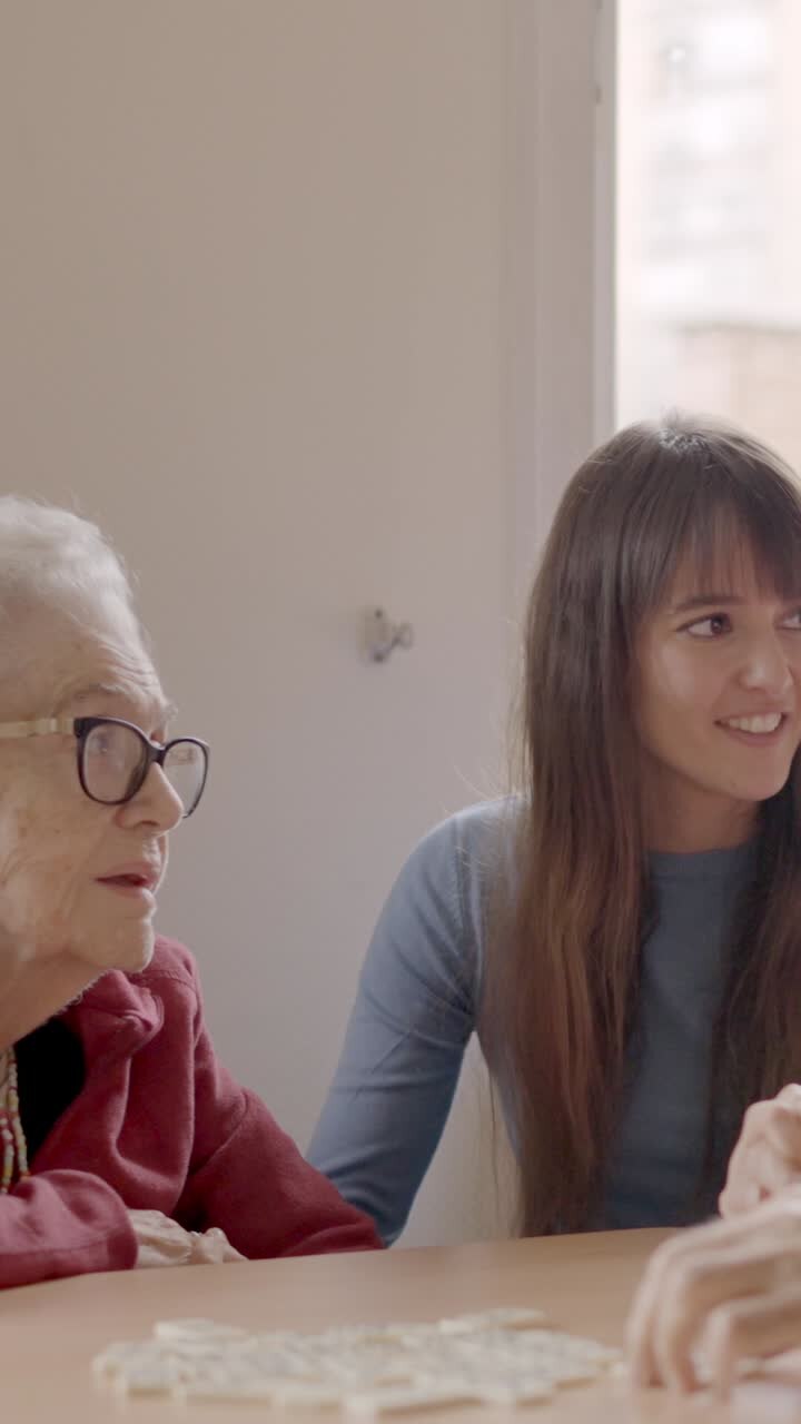 Grandfather talking with the family during a visit in geriatric