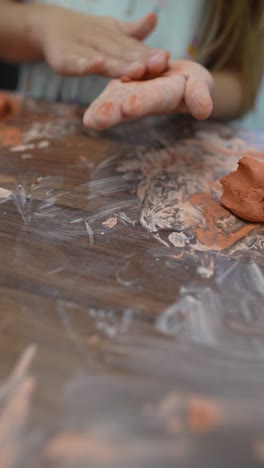 child playing with play-doh