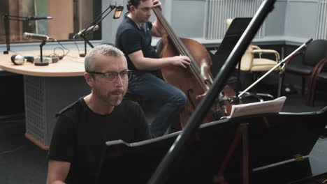 jazz band recording music at studio