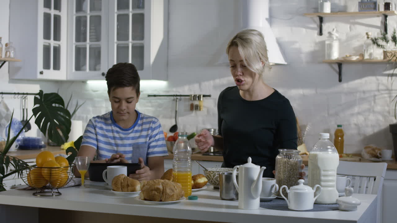 Mother and Son Enjoying Breakfast