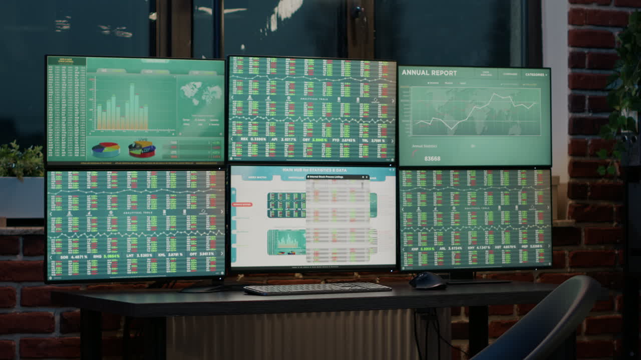 Nobody at empty desk with multi monitors workstation