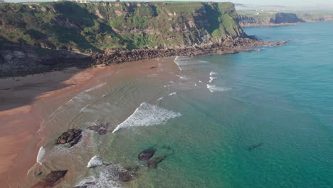 Aerial-View-Of-A-Scenic-Coastline-Landscape-In-Suances,-Cantabria,-Spain