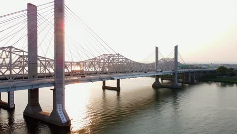 Aerial-drone-view-of-cars-and-trucks-on-bridges-in-Louisville,-sunny-evening-in-Kentucky,-United-states