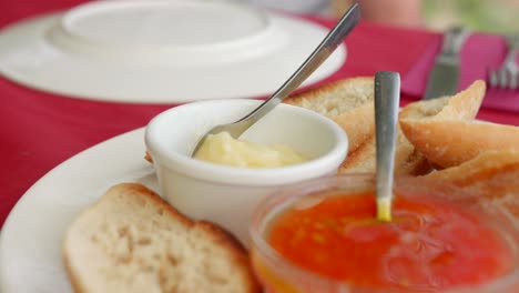 Close-up-shot-of-typical-appetizer,-pan-con-tomate-served-on-a-table-in-Spain