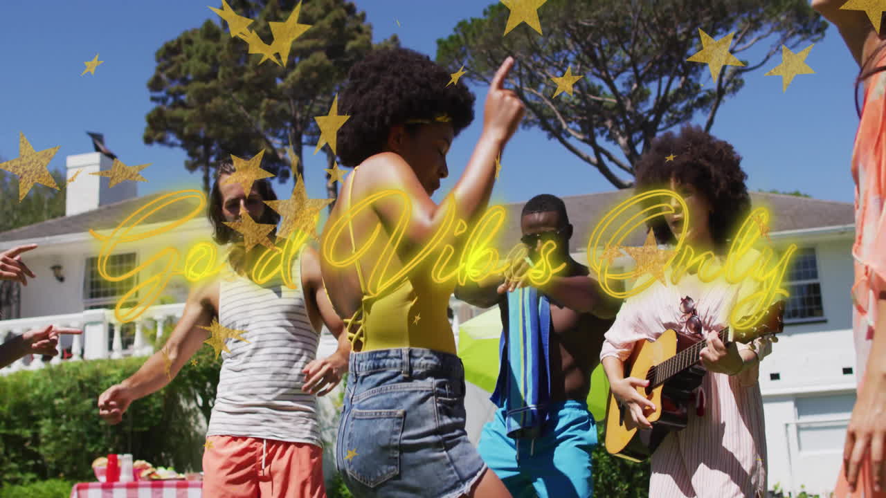 People dancing outdoors with Good Vibes Only text and star animation overlay