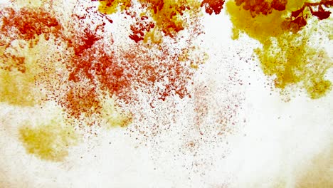 4k footage of colorful ink drops in water, isolated abstract background. pouring ink in water. underwater paint mix. slow psychedelic dye swirls, colored smoke explosion. splashing, floating liquid