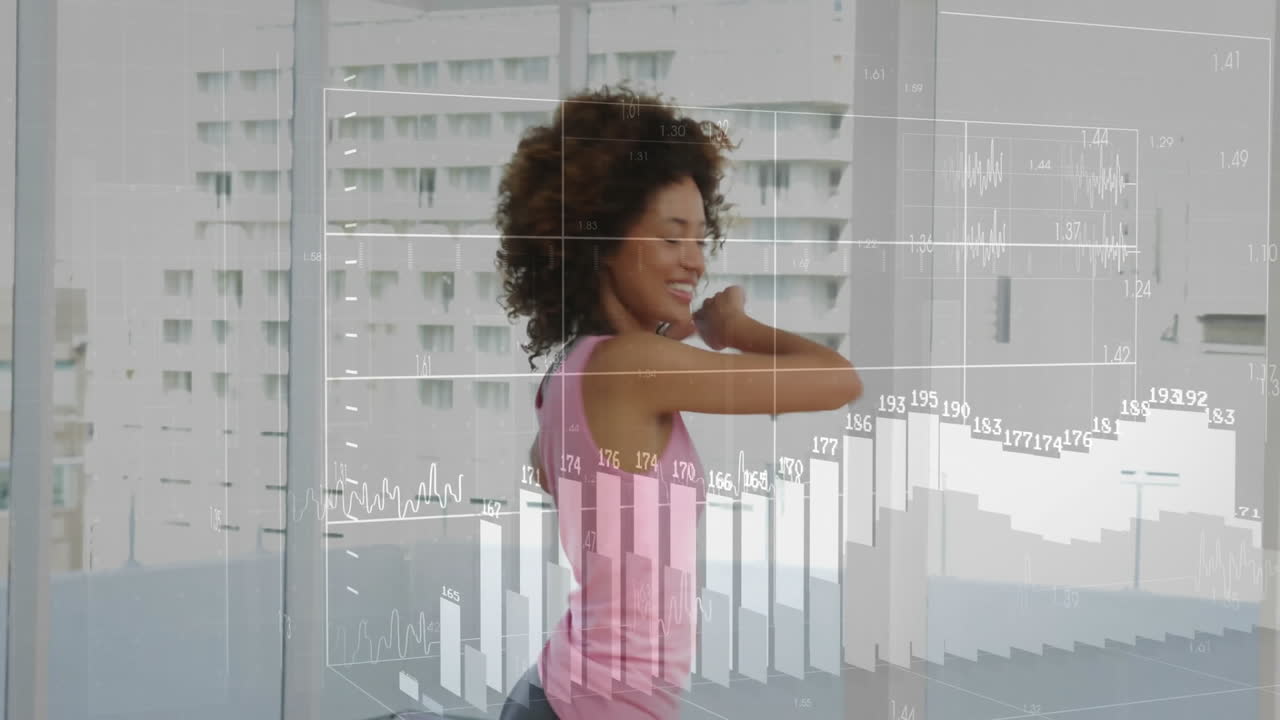 Dancing woman with animation of financial data charts in modern apartment