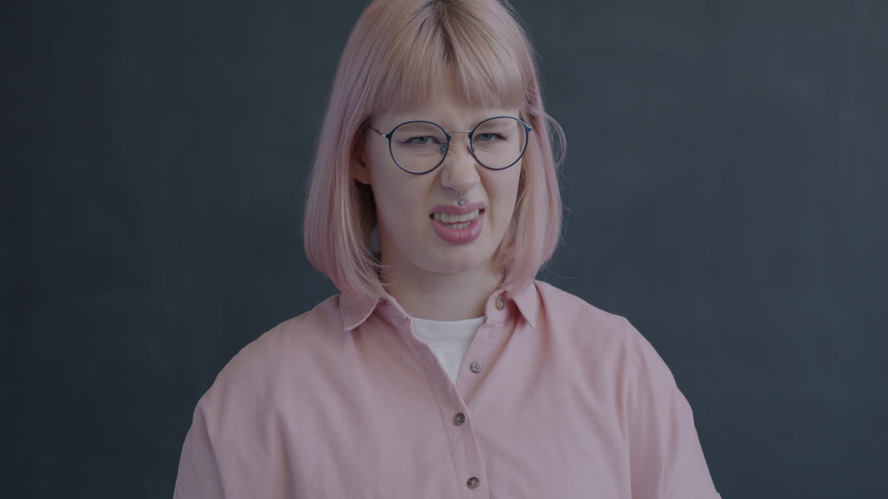 Woman with Pink Hair and Disgusted Expression