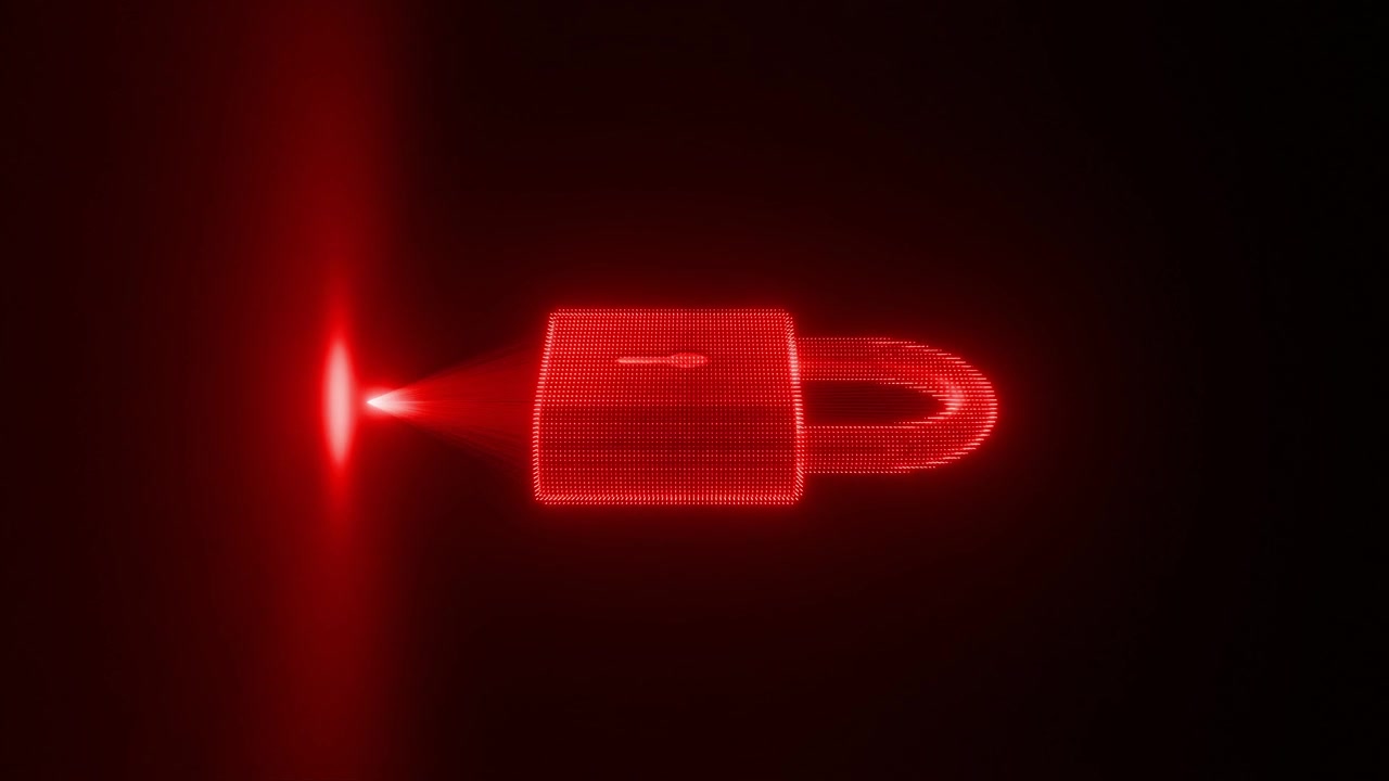 red holographic projection of a padlock on a dark background. Futuristic concept of cybersecurity, data protection, and digital safety vertical