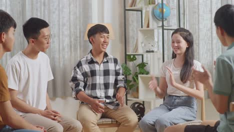 teenagers having a conversation in a circle