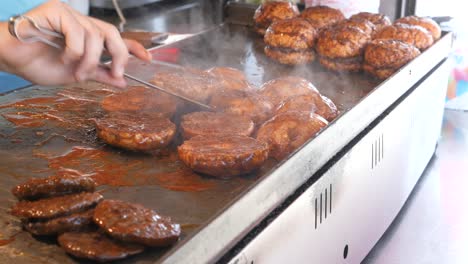 cooking burgers on a grill