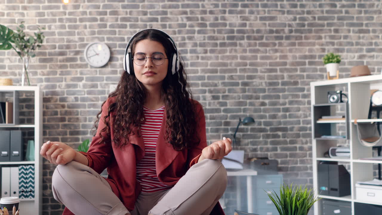 Woman Meditating in Modern Office