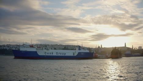 cargo ship at sunset in istanbul harbor