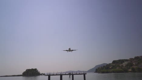 airplane closing in to land in greece