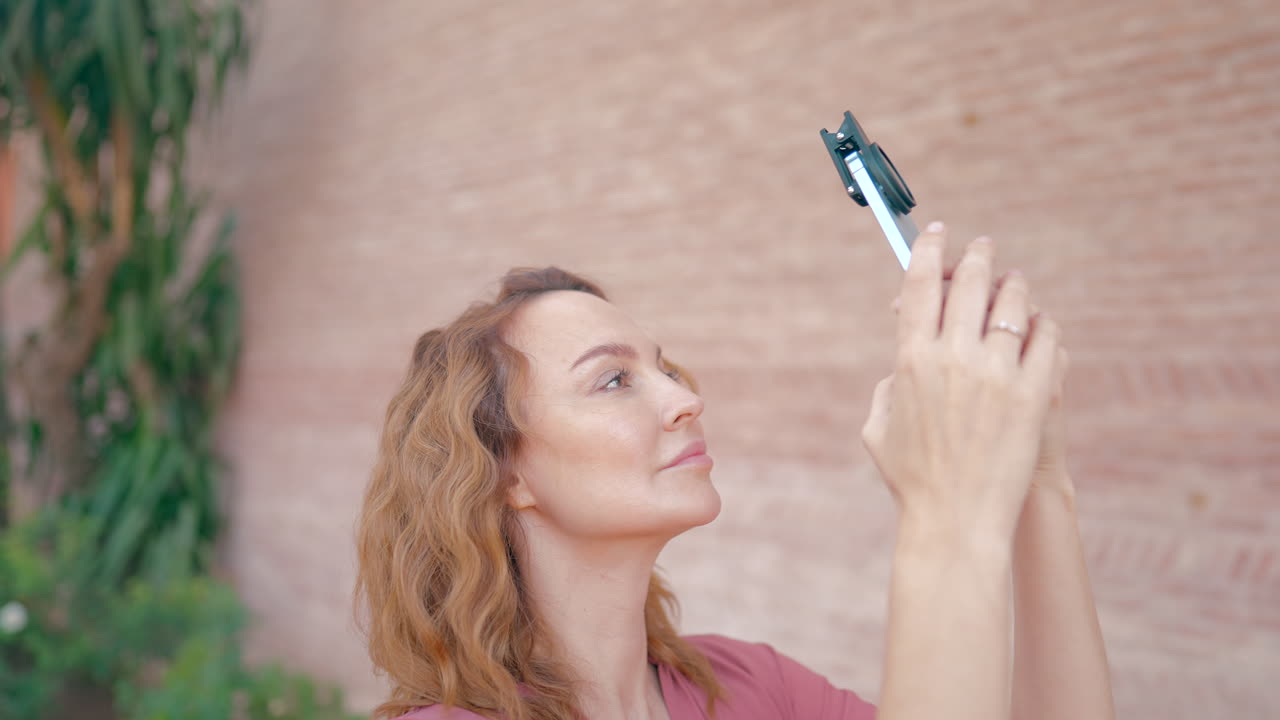 Woman Taking a Selfie Outdoors