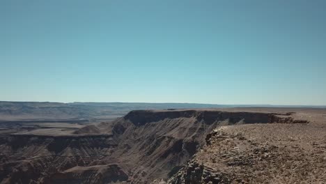 Fish-River-Canyon-in-Namibia,-Africa-Aerial-Drone-Shot