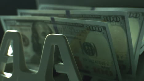 us 100 dollar bills in a counting machine