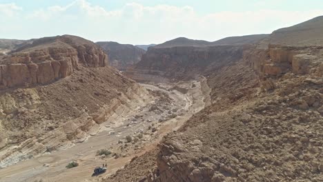 Aerial-footage-of-a-large-canyon-in-the-desert