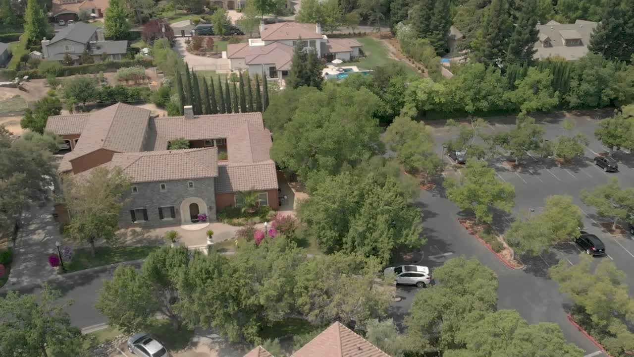 Parking lot of a nearby golf course. This footage shows the greenery of the location