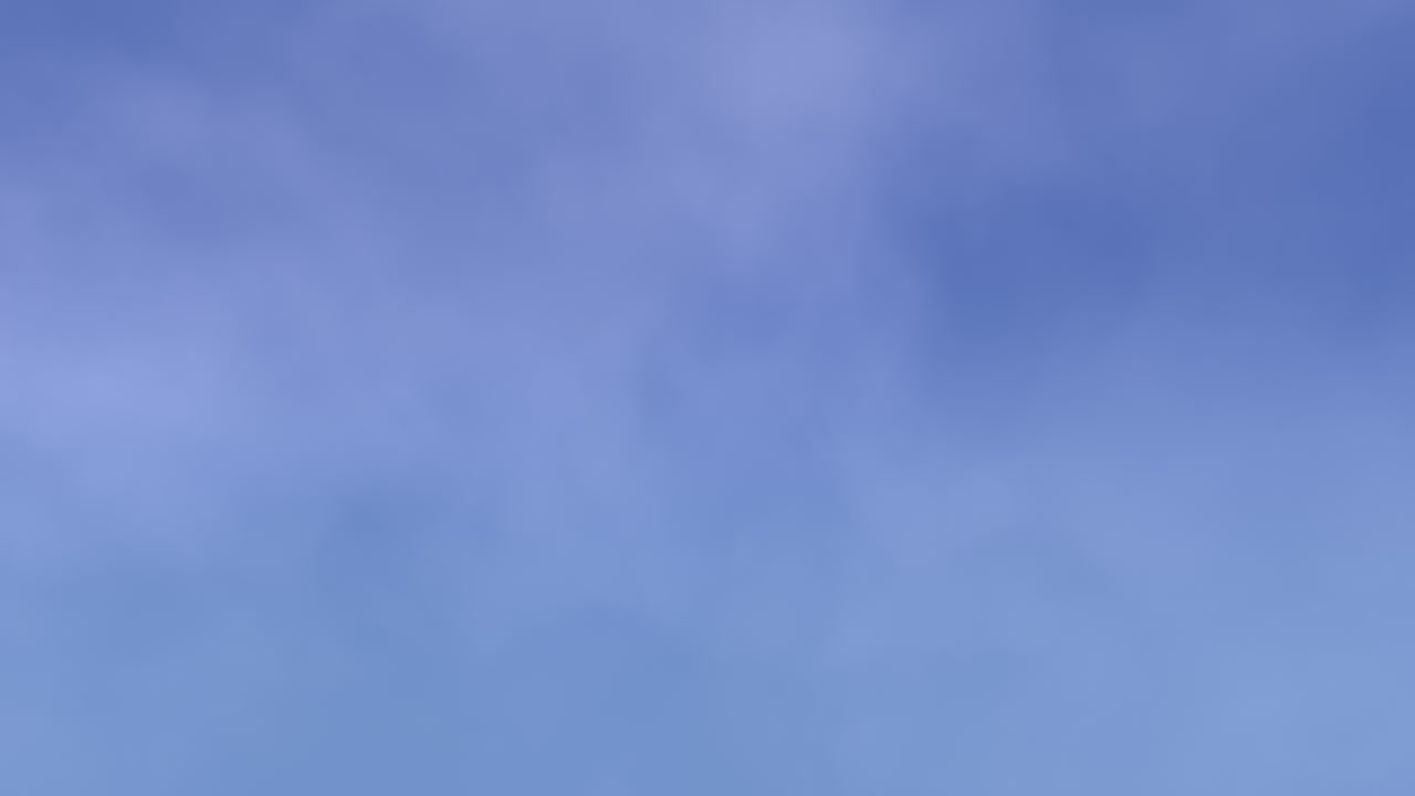 disparo de alto ángulo de un cielo azul claro con nubes blancas esponjosas