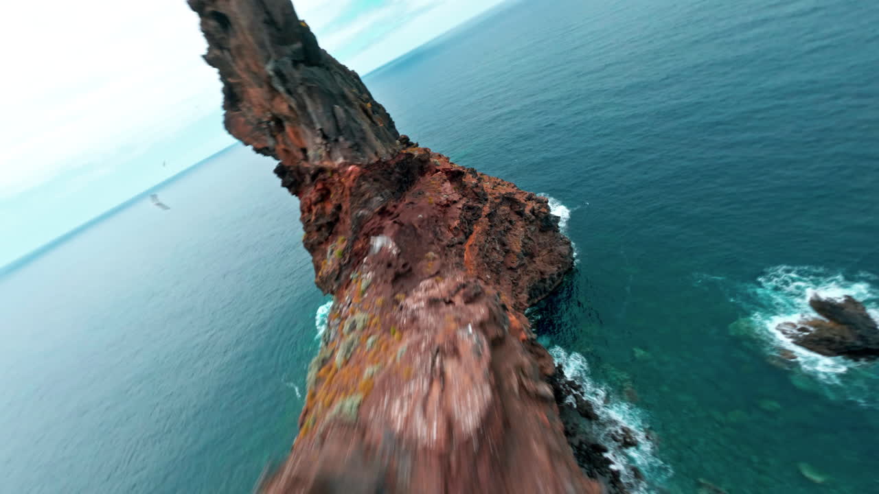 FPV drone explores rocky coast of La Palma, Canaries with ocean views