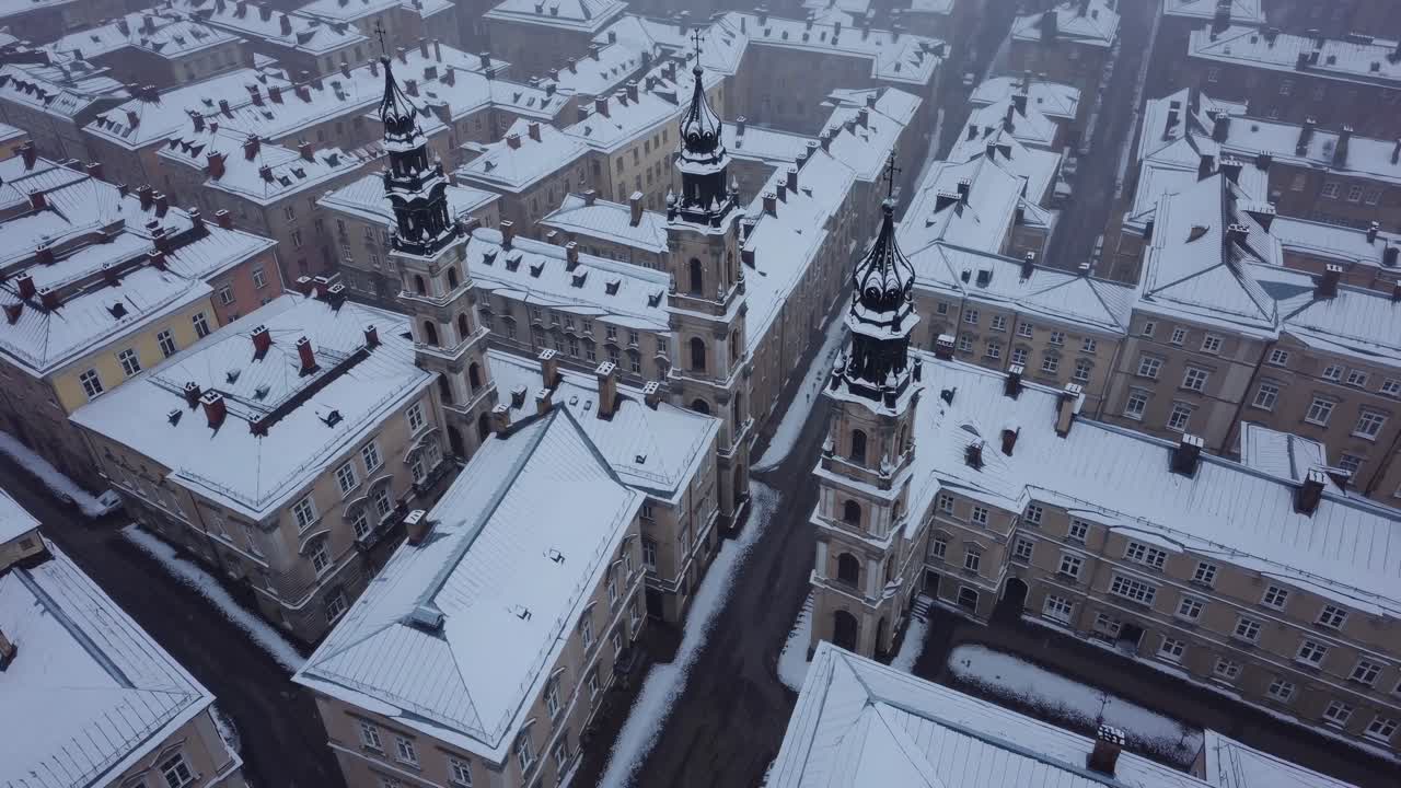 Snowy Cityscape with Historical Architecture