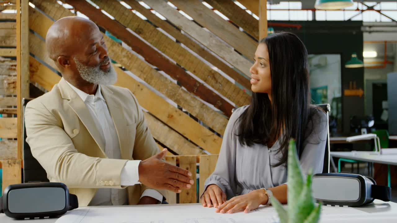 Executives handshake in the office 4k