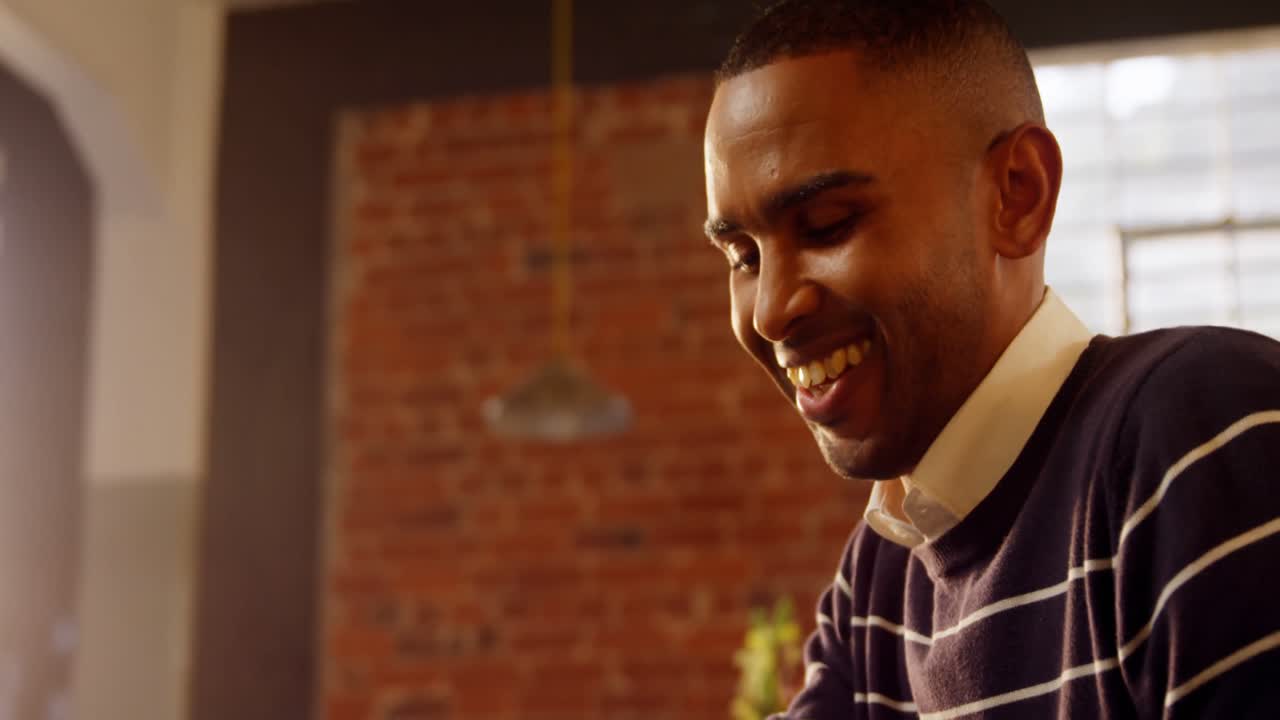 Happy man using mobile phone 4k