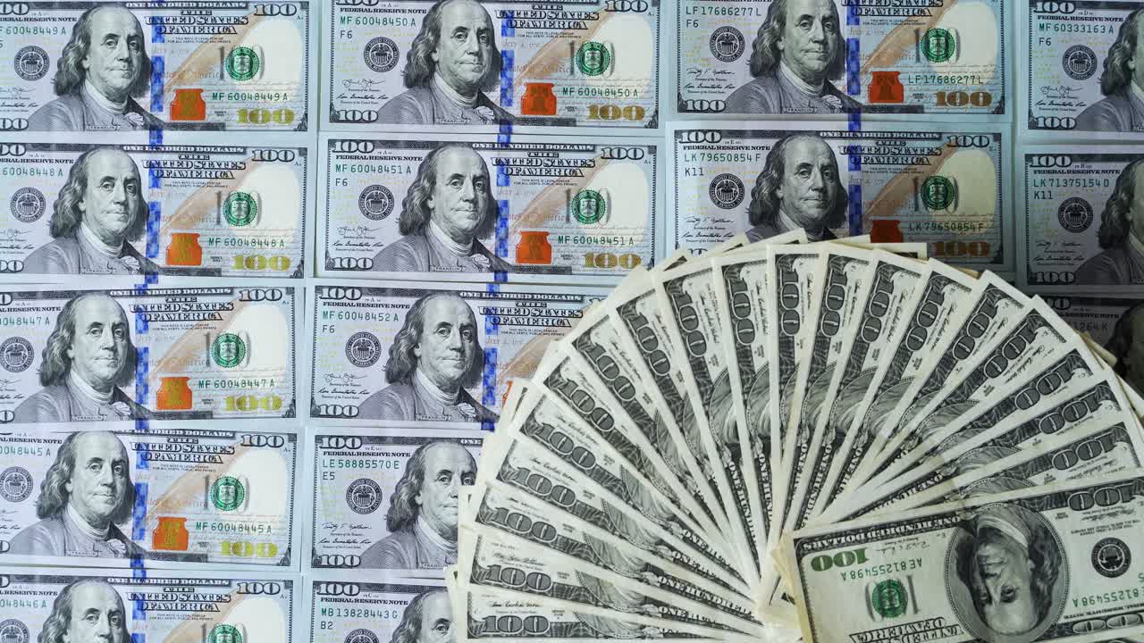 Stacked and Fan of US 100 Dollar Bills